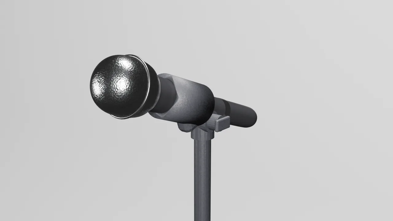 Close-up of a cordless microphone in its clip on a stand.